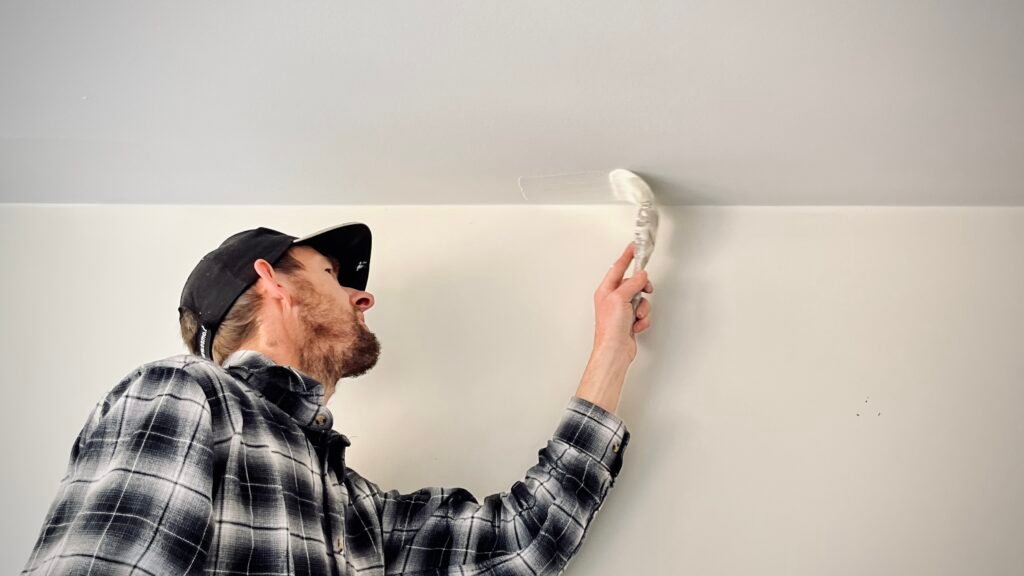 Kevin completing a residential painting renovation in Queenstown